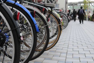 Bicycle parked on street in city