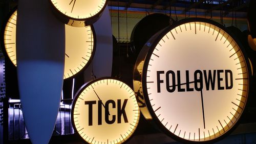 Close-up of illuminated clock