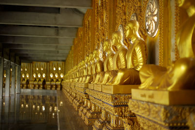 Statues in illuminated building