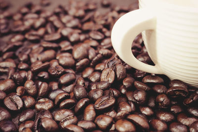 Close-up of coffee beans on table