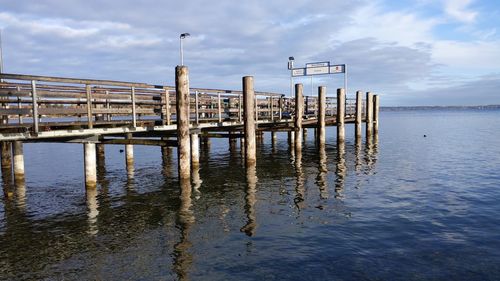 Pier on sea against sky