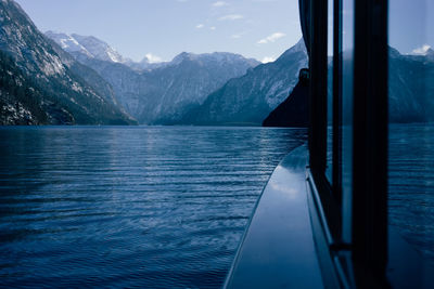 Scenic shot of calm lake against mountain range