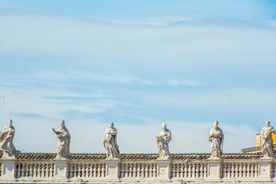 Low angle view of statue against cloudy sky