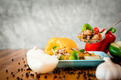 Close-up of fruits in plate on table