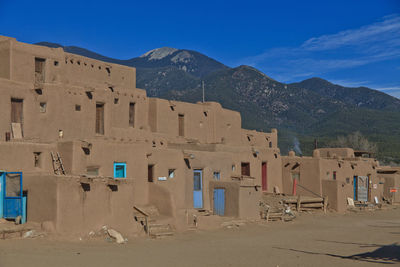 Built structure with mountains in background