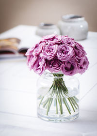 Close-up of flower vase on table