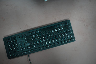 High angle view of computer keyboard on table