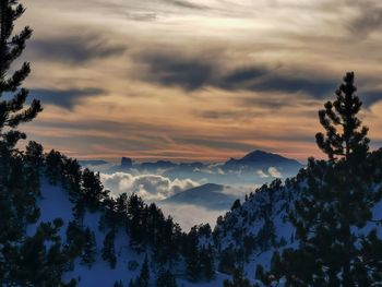 Scenic view of mountains against sky during sunset