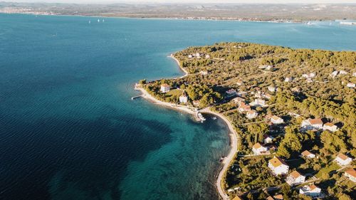 High angle view of bay against clear sky