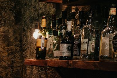 View of wine bottles in glass bottle