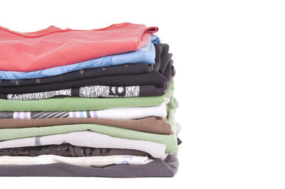 Close-up of clothes over white background