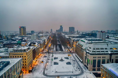 High angle view of road amidst buildings in city