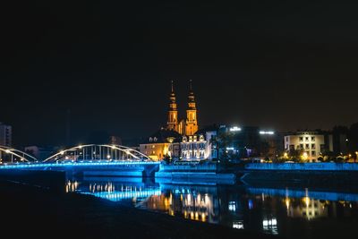 Illuminated buildings at waterfront