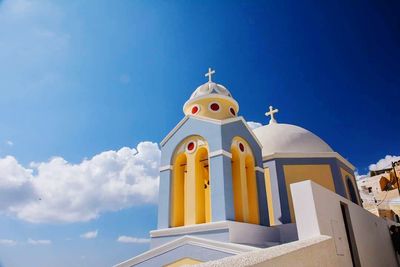 Low angle view of church against blue sky