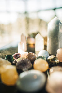 Variety of gemstones arranged on table at retreat center