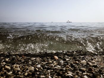 Scenic view of sea against clear sky