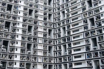LOW ANGLE VIEW OF RESIDENTIAL BUILDING