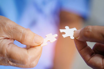 Close-up of person holding hands