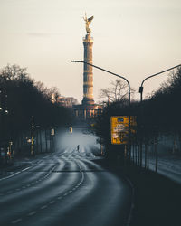 View of communications tower in city