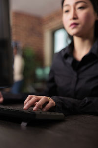 Young woman using laptop