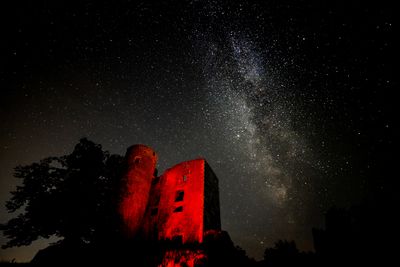 Low angle view of arnstein castle against sky at night