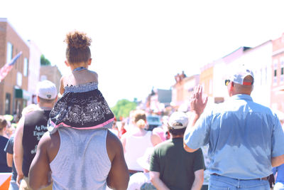 Rear view of crowd in city