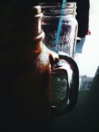 Close-up of hand holding water