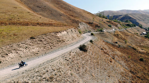 Scenic view of mountain road against sky