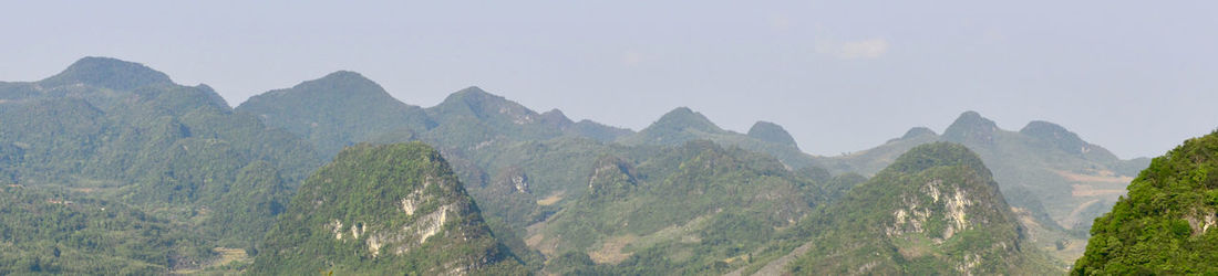 Panoramic view of mountains against clear sky