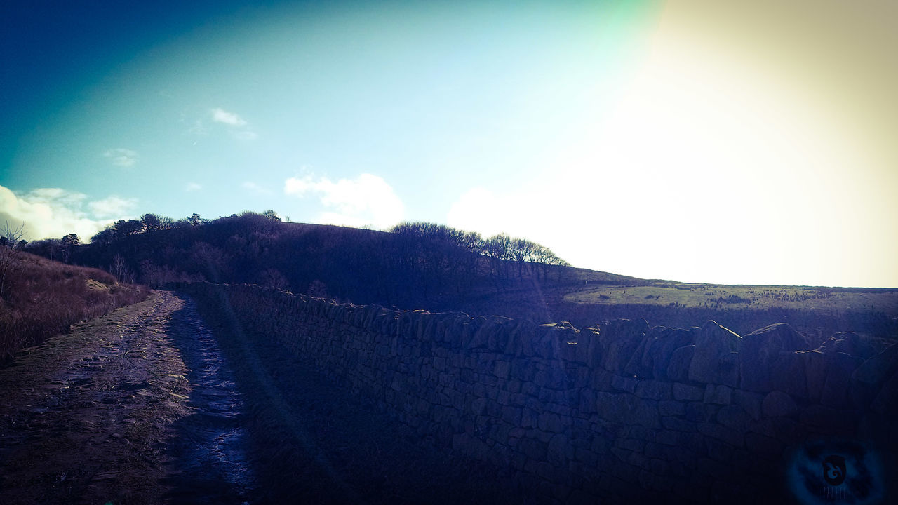 sky, landscape, nature, environment, tranquility, no people, tranquil scene, cloud - sky, beauty in nature, scenics - nature, day, sunlight, land, vignette, non-urban scene, outdoors, field, auto post production filter, road, rural scene