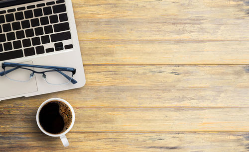 Directly above shot of coffee cup on table