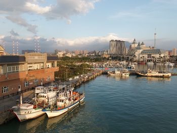 High angle view of ferry boats on river in city