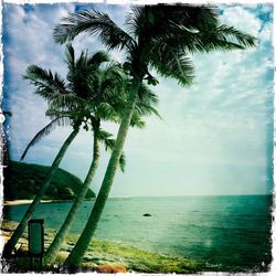 Scenic view of sea against cloudy sky