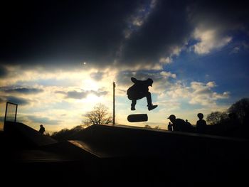 Low angle view of street light against sky