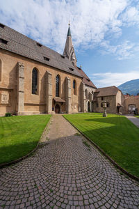 View of temple against building