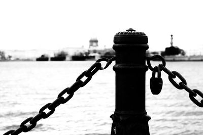 Close-up of chain against sky