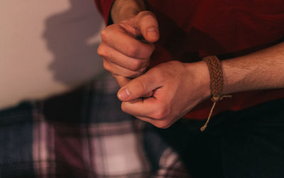 Cropped image of woman holding hands