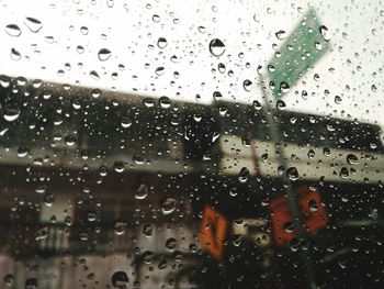 Close-up of wet window in rainy season