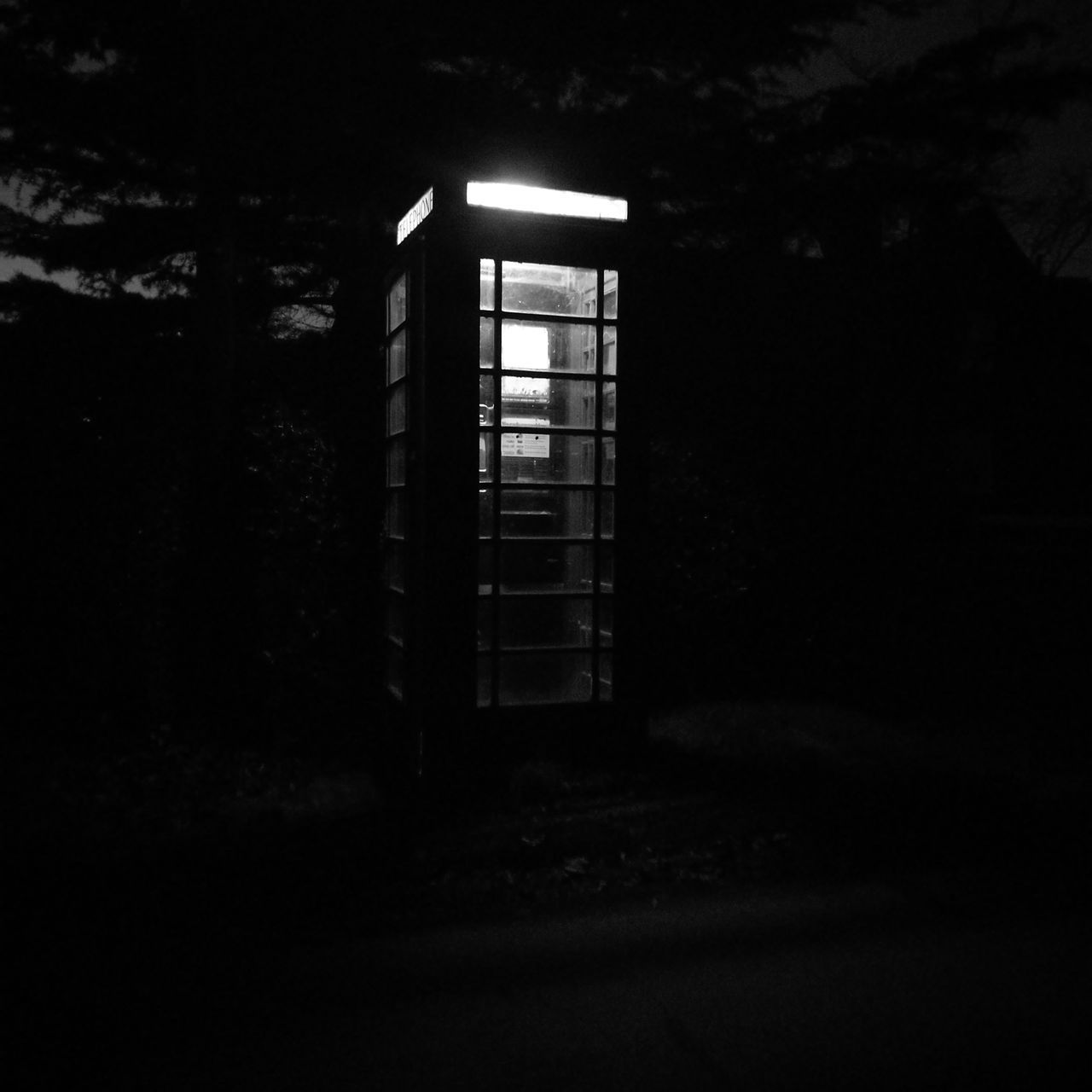 CLOSE-UP OF WINDOW IN THE DARK