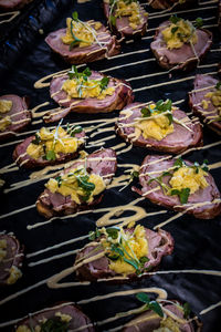 High angle view of meat on barbecue