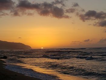 Scenic view of sea against sky during sunset