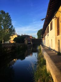 View of canal along buildings
