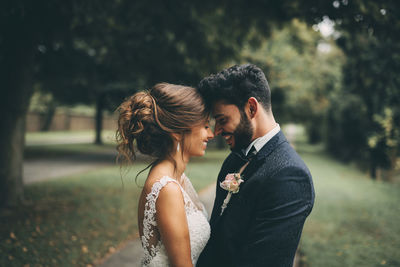 Young couple standing outdoors