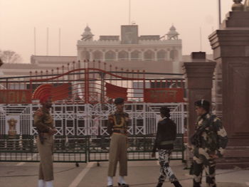 People in front of historical building