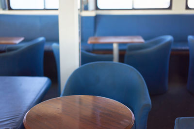 Empty chairs and tables at restaurant