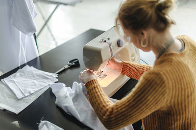 Woman working on table