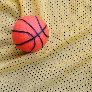 High angle view of basketball on fabric