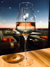 Close-up of wine glass on table at restaurant