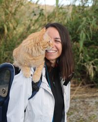 Smiling woman with dog