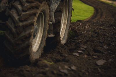 Close-up of tire track on field